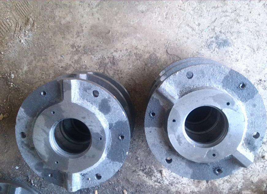 Conas páirteanna iarann ​​teilgthe liath ard-neart a tháirgeadh gan miotail lómhara cosúil le cóimhiotail a chur leis?